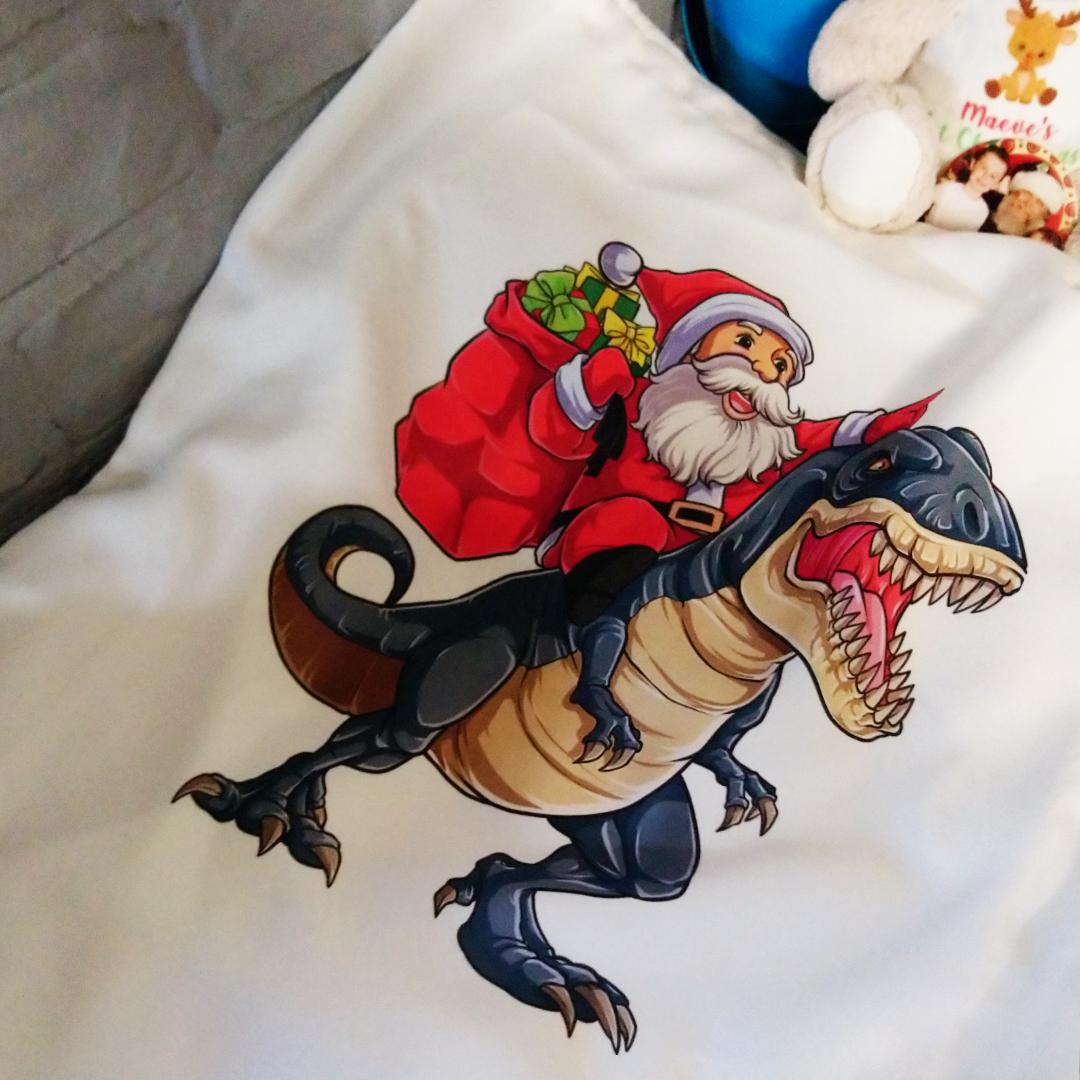 Santa Riding Blue Dino Santa Sack - Personalised