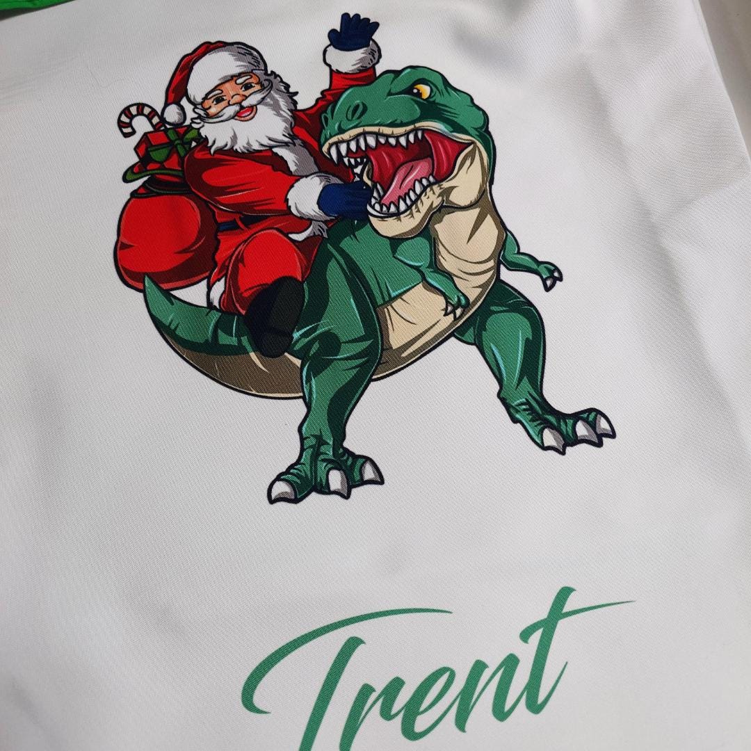 Santa Riding Green Dino Santa Sack - Personalised